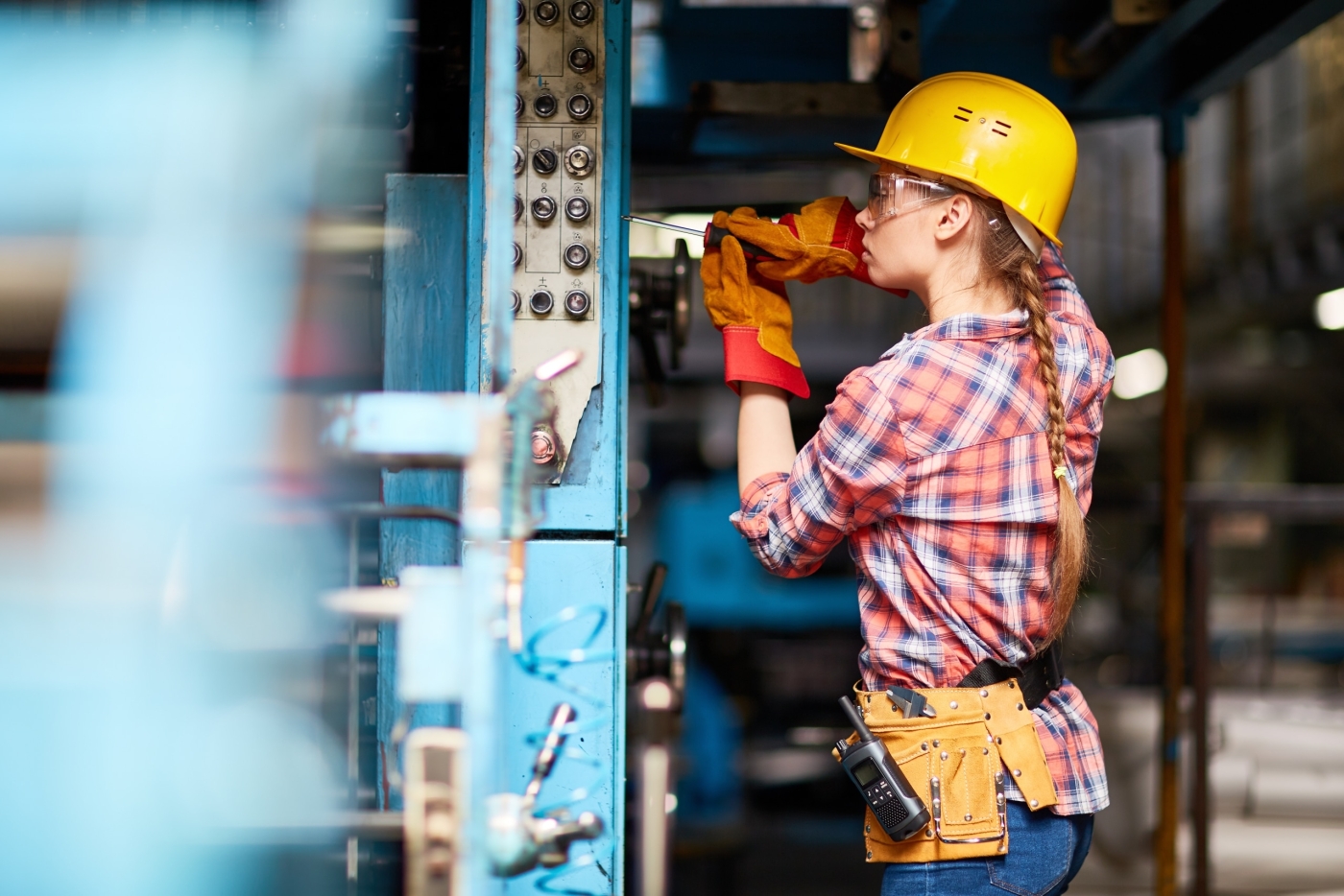 female electrician at work on site